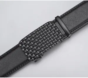 Detail of black men's automatic buckle with grid pattern and Saffiano leather belt