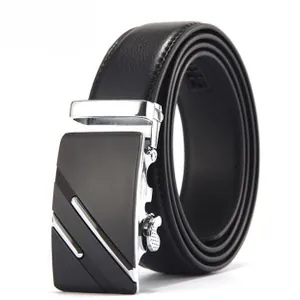 Close-up of men's black leather belt with silver automatic buckle and matte textured detail