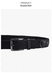 Detail of black elastic braided belt showing woven texture and gunmetal buckle