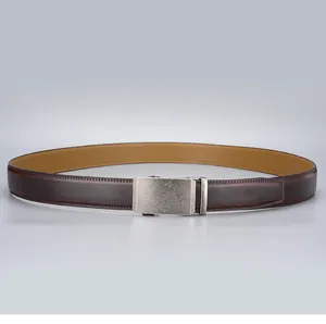 Detailed view of dark brown cowhide leather belt with premium alloy automatic metal buckle