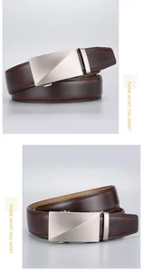 Detail of premium brown leather belt with silver brushed metal automatic buckle