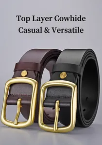 Detail of high-quality cowhide leather belts with polished gold metal pin buckles