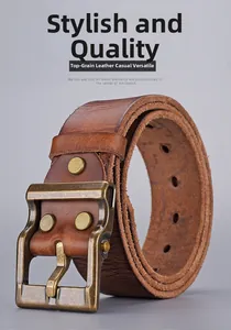 Close-up of vintage brown top grain cowhide leather belt with aged bronze metal buckle
