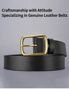 Detail of premium black cowhide leather belt featuring a matte gold needle buckle