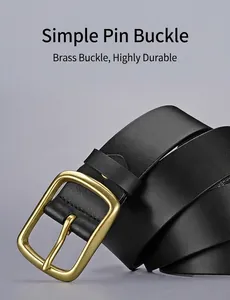 Detailed close-up of premium black cowhide leather belt with a matte gold brass buckle
