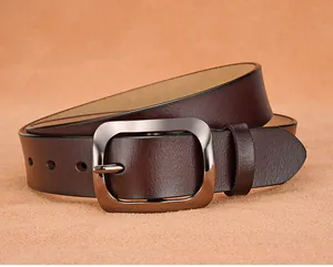 Detailed view of dark brown leather belt with high-quality polished metal buckle