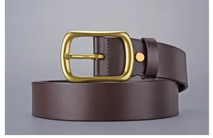 Detail view of premium dark brown leather belt with vintage brass pin buckle and fine texture