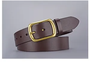 Detail of brown cowhide leather belt featuring a matte brass square pin buckle