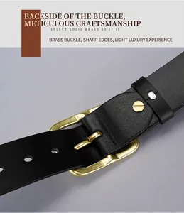 Detailed macro view of solid brass pin buckle and premium black leather belt construction