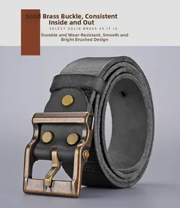 Detail of solid brass buckle with brushed finish on a black genuine leather belt