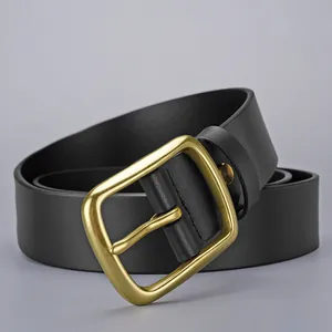 Classic men's black leather belt with premium gold rectangular buckle in a rolled view