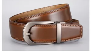 Close-up of brown leather belt showing brushed metal buckle and fine double stitching