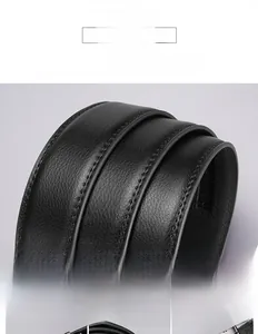 Macro detail of premium genuine leather belt showing natural texture and fine stitching