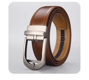 Macro detail of men's brown leather belt with silver matte automatic buckle and stitching