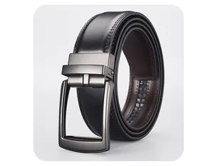 Macro view of gunmetal automatic buckle and black genuine leather belt with gear track