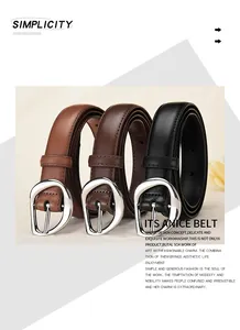 Close-up of stylish leather belts in black, brown, and tan with silver irregular buckles