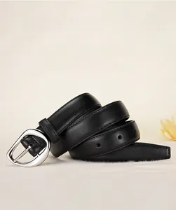 Close-up of a black leather belt with a polished silver oval buckle and metal pin