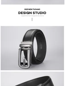 Detail of premium black leather belt with lychee texture and gun-metal alloy buckle