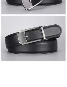 Detail of premium black lychee pattern leather belt with gunmetal gray buckle
