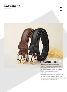 Detail of slim black and brown leather belts with elegant golden oval pin buckles