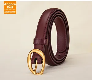 Detail of Angora Red leather belt with a vintage matte gold buckle for women