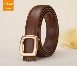 Close-up of brown leather belt with gold rectangular buckle and elegant stitching detail