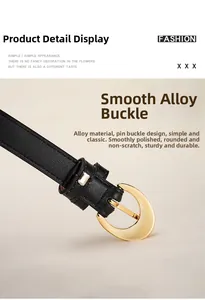 Detailed macro view of the solid gold alloy pin buckle and smooth black leather belt strap