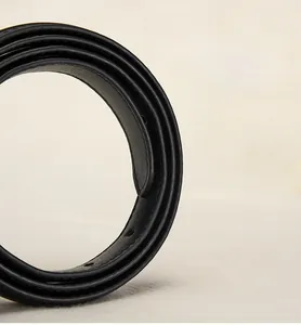 Detail view of smooth burnished edges and fine texture on a black leather belt