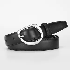 Women's black leather belt with a unique silver irregular oval buckle for jeans