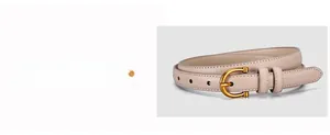 Detailed view of khaki leather belt with golden U-shaped buckle and fine stitching