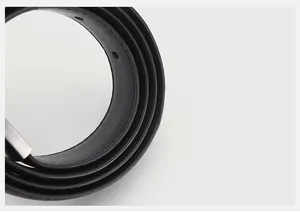 Close-up of black genuine leather belt showing natural texture and durable edge stitching