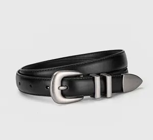 Detailed view of black genuine leather belt with matte silver buckle and stitched edges