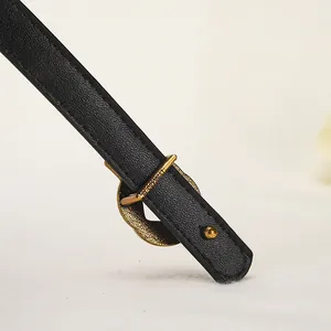 Cintura sottile in vera pelle nera da donna con fibbia dorata intrecciata e trama litchi