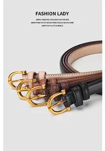Close-up of slim leather belts for women with gold D-ring buckles in various colors
