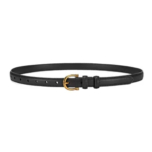 Classic women's thin black leather belt with golden horseshoe buckle on white background