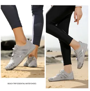 Detail of gray breathable water shoes with anti-slip rubber sole for beach hiking