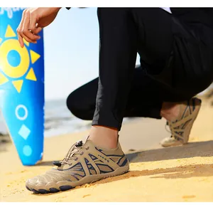 Outdoor barefoot water shoes featuring quick-lace system and grippy five-toe rubber sole
