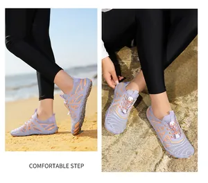 Close-up of quick-dry water shoes featuring breathable mesh fabric and adjustable toggle lace
