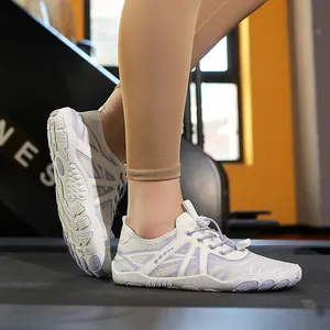 Breathable mesh five-finger water shoes in white and lilac with anti-slip rubber soles