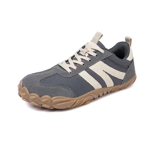 Grey outdoor breathable sports shoes with non-slip gum rubber sole and mesh upper