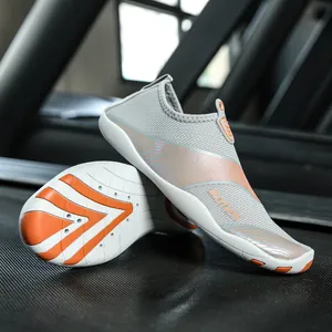 Scarpe da scoglio grigie con suola in gomma arancione antiscivolo per nuoto outdoor
