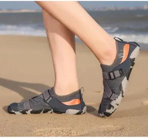 Close-up of quick-dry wading shoes with non-slip rubber soles and adjustable buckle straps