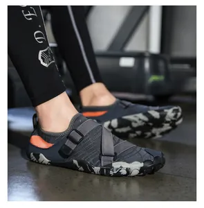 Detailed side view of quick-dry water shoes with breathable mesh and camo rubber sole