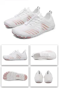 Detailed views of white barefoot water shoes with pink wave patterns and non-slip rubber soles