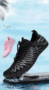 Detailed view of quick-dry water shoes with anti-slip rubber soles for beach and hiking