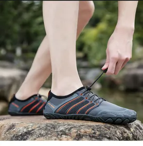 Close-up of quick-lace system and breathable mesh fabric on outdoor water shoes