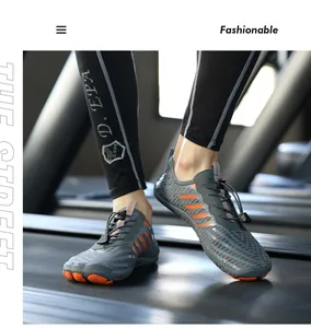 Detail of breathable barefoot shoes with quick-lace system used on a gym treadmill