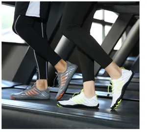 Action shot of barefoot running shoes on treadmill showing grip and flexible outsoles
