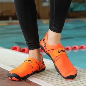 Scarpe da scoglio arancioni per nuoto ed escursioni con suole in gomma antiscivolo