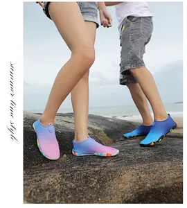 Detail of breathable non-slip water shoes in gradient colors for outdoor hiking and swimming